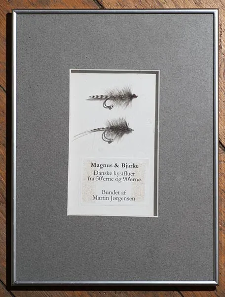 My first frame ever - Several things went wrong here: the opening in the matte is not exactly perfectly aligned with the frame, the flies are not visually in line and the paper sign was glued with a glue, which has turned brown over the decade-or-so that has passed since the frame was made. But it still hangs on my wall and carries a lot of memories.