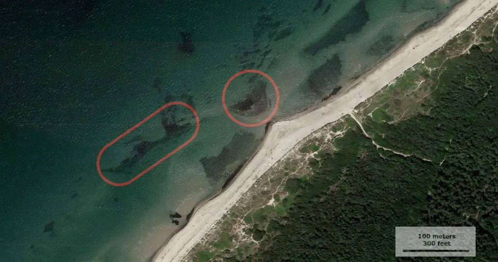 On open beaches - Some reefs are invisible from land and only found when you wade. These two are good examples. On this open stretch of coast the current is good, and they fish well in the night. The other dark patches are weed patches, and may fish well at night, but rarely as well as the stone reefs.